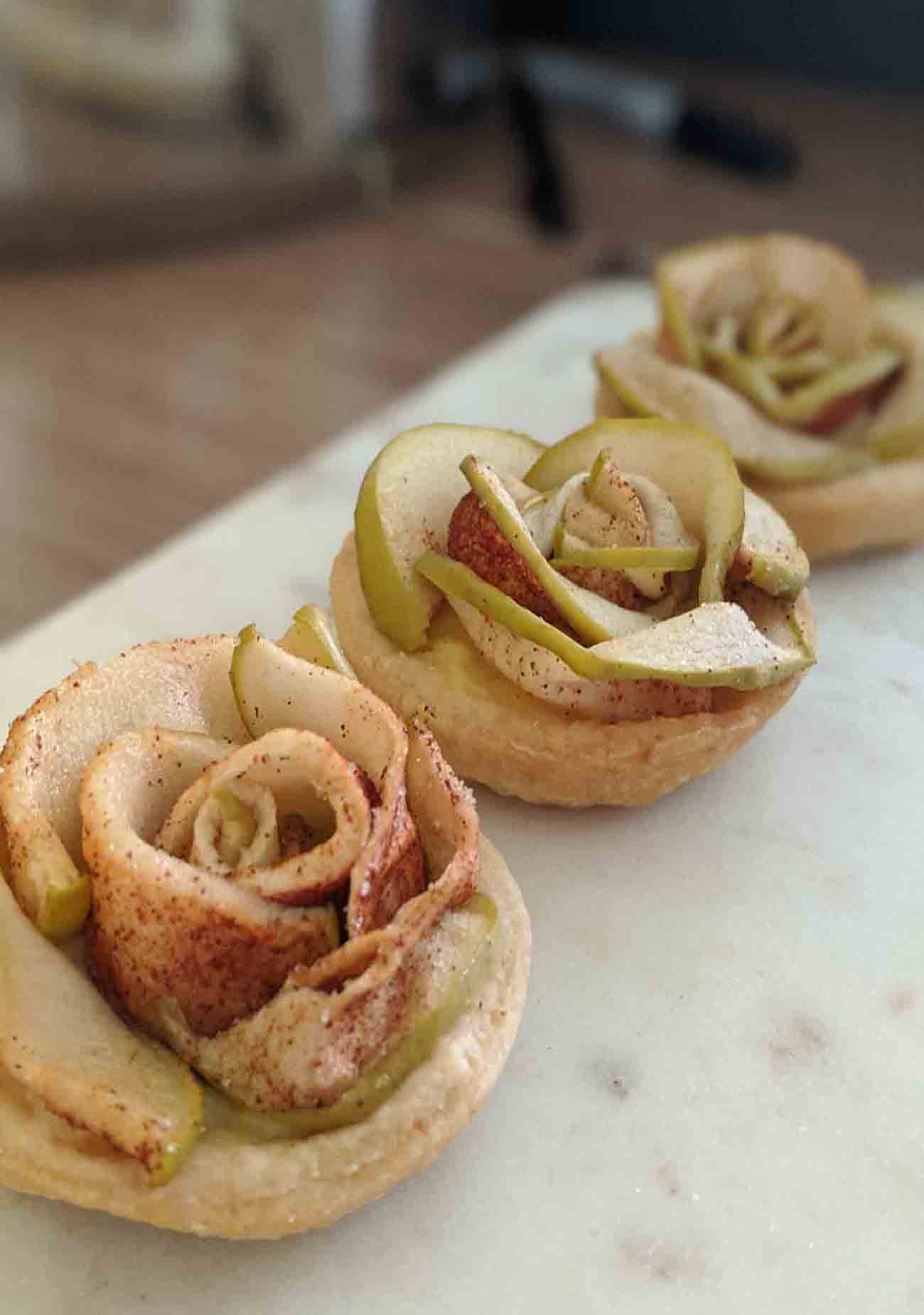 Apple tarts in a rose shape baked by Devon